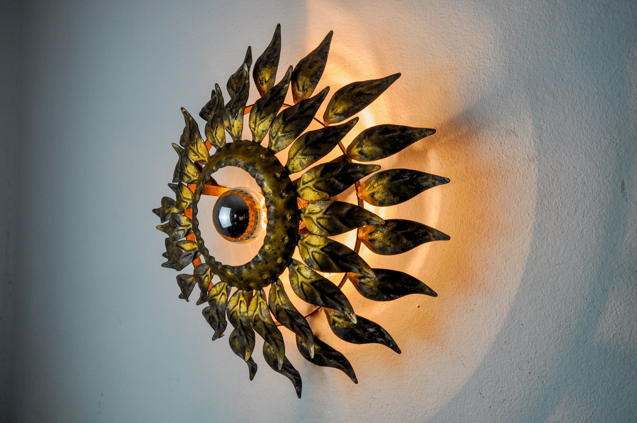 Sun wall lamp by ferro arte, metal and gold leaf, Spain, 1960