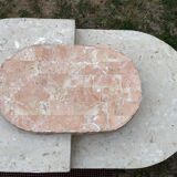 Asymmetrical coffee table design 80s in Mactan stones, travertine by Magnussen Ponte.