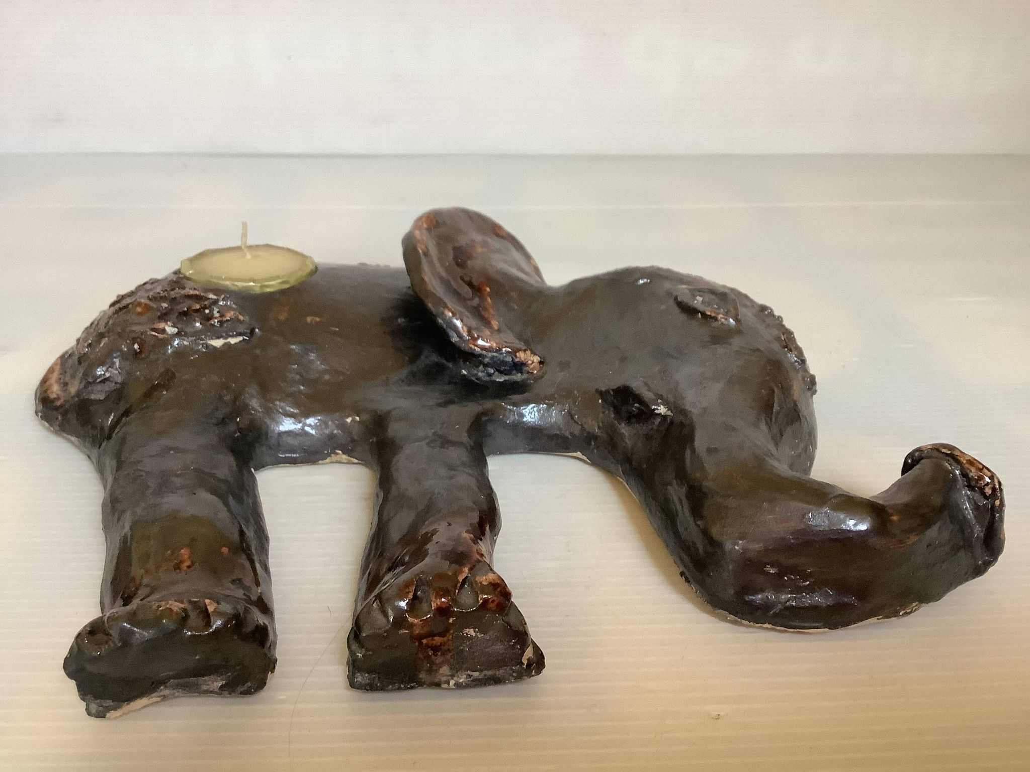 Iridescent ceramic elephant candlestick signed