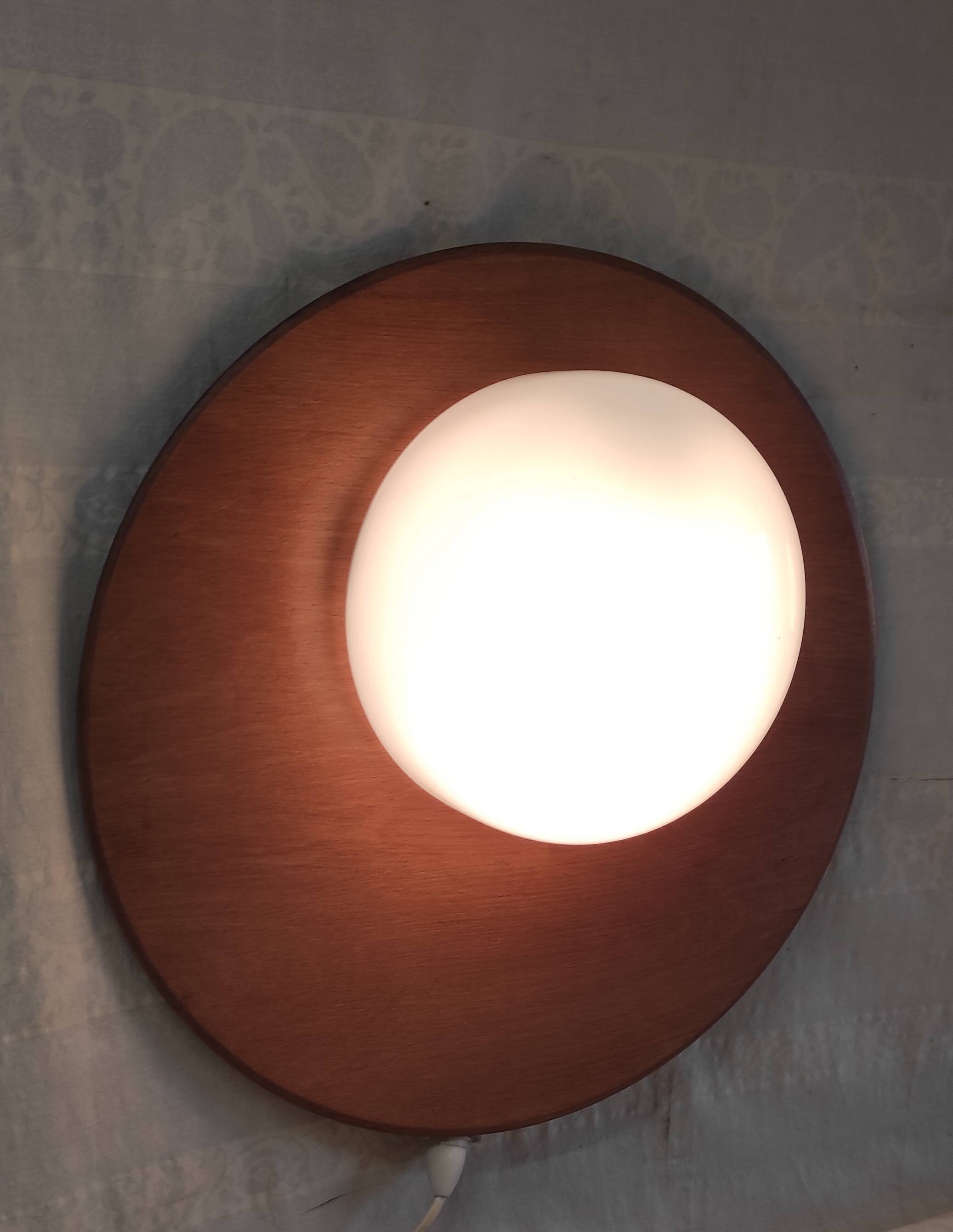 Globe-shaped wall sconces in opaline glass and wood - mid-20th century