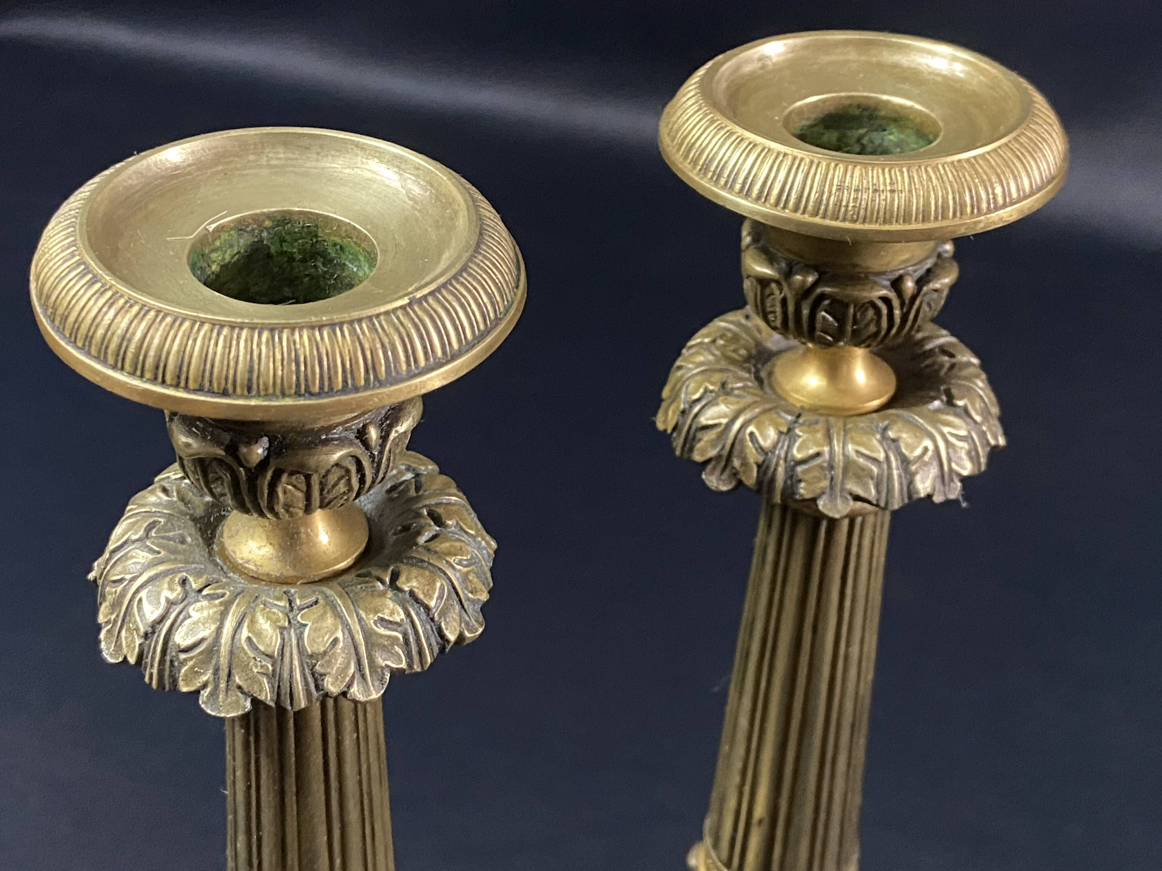 Pair of gilt and chiseled bronze candlesticks from the Restoration period