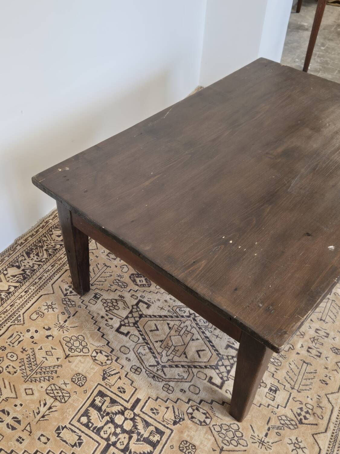 Rustic farmhouse coffee table from the 1900s with two drawers.