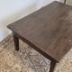 Rustic farmhouse coffee table from the 1900s with two drawers.