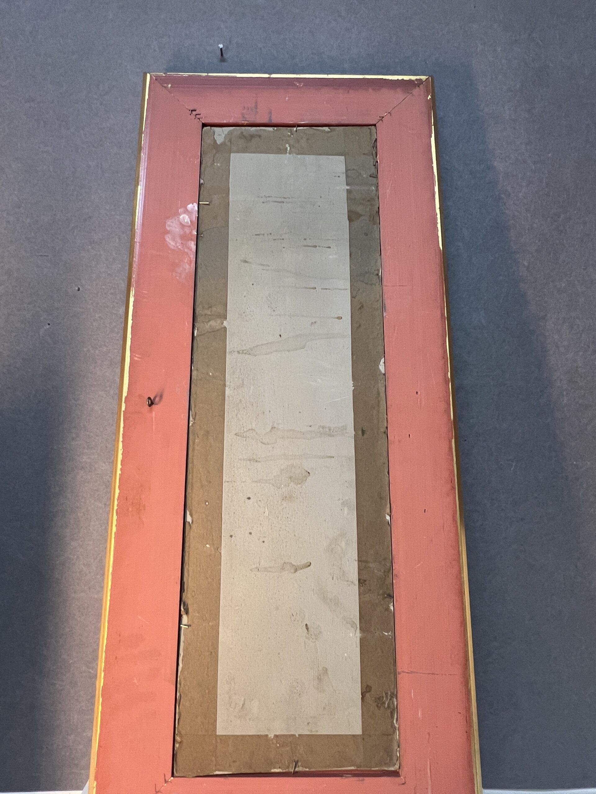 A. Laemmermann, oil painting on cardboard depicting a rocky landscape.