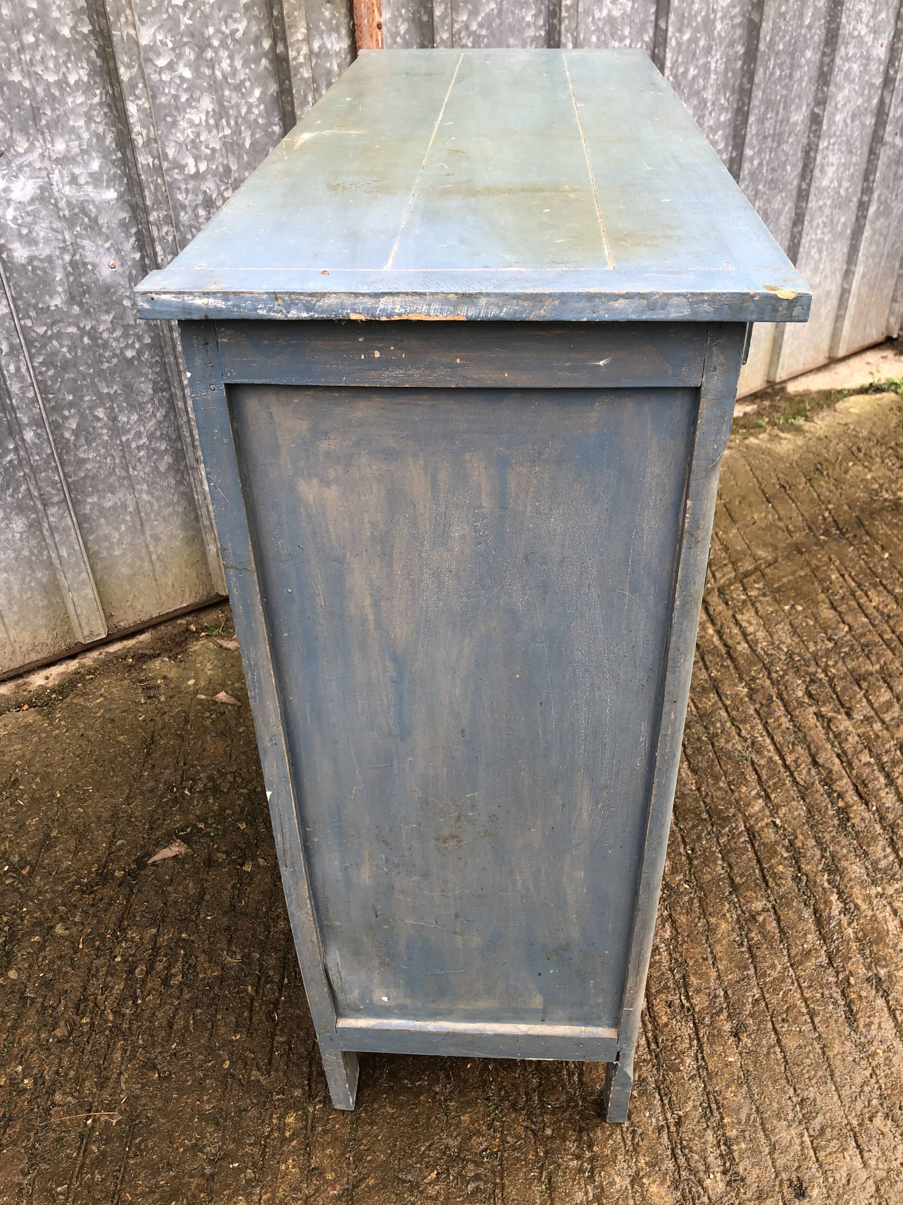 Parisian sideboard painted in blue with 2 doors and 2 drawers.