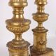 Pair of antique Empire candlesticks in wood, Europe, early 19th century.