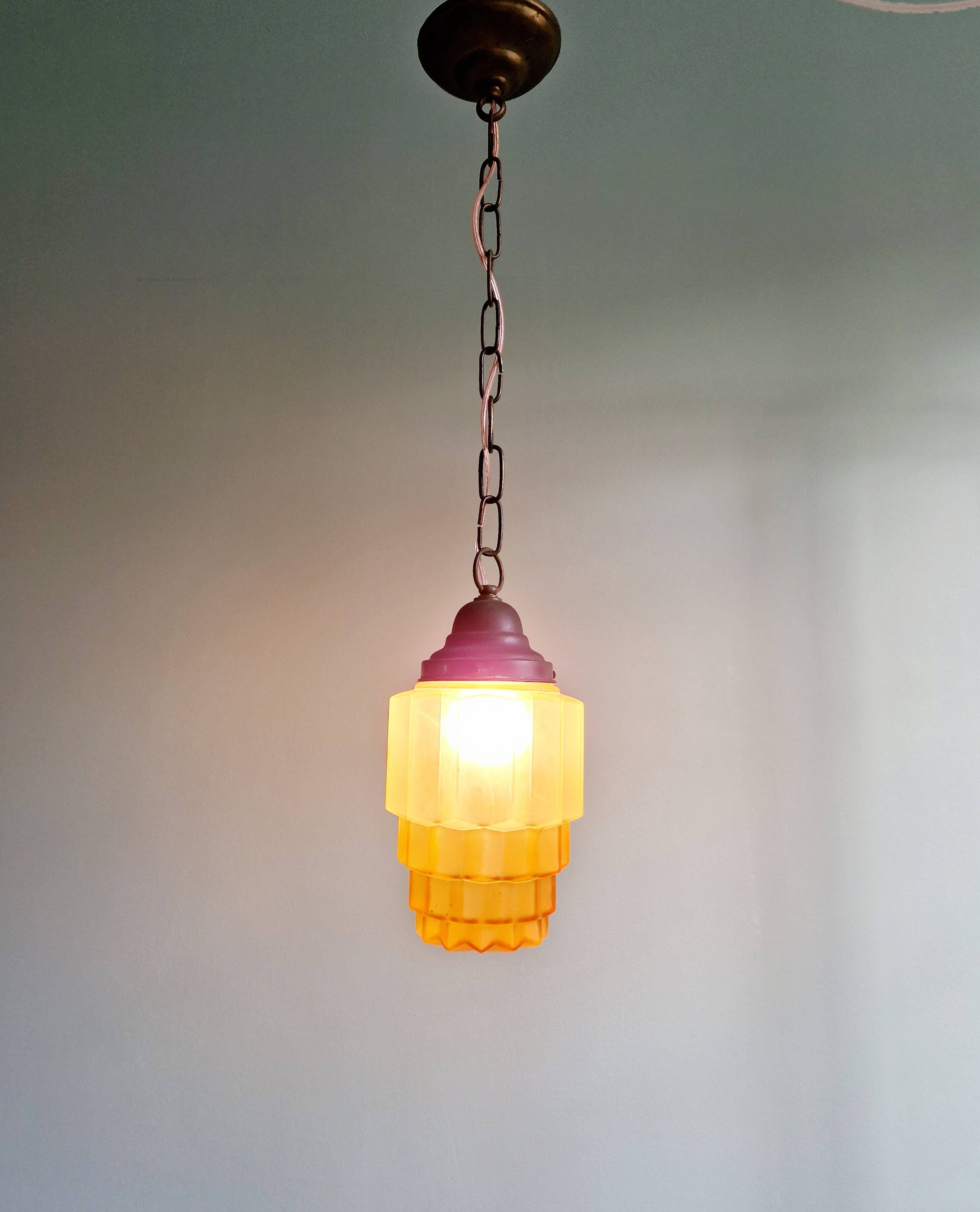 Art Deco Skyscraper type pendant lamp in amber glass, 1920s-30s