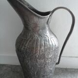 Old metal pitcher vase