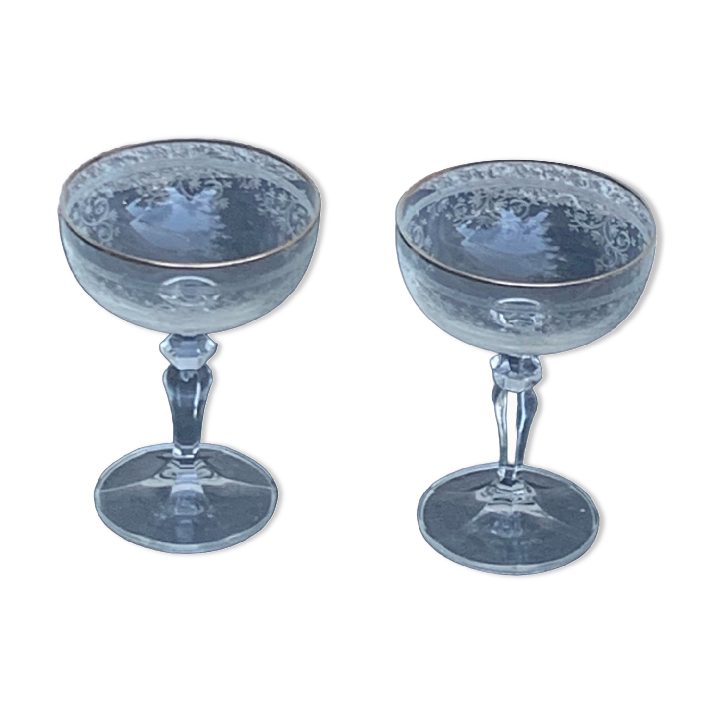 Two crystal champagne glasses and gilded borders antique engraved pattern