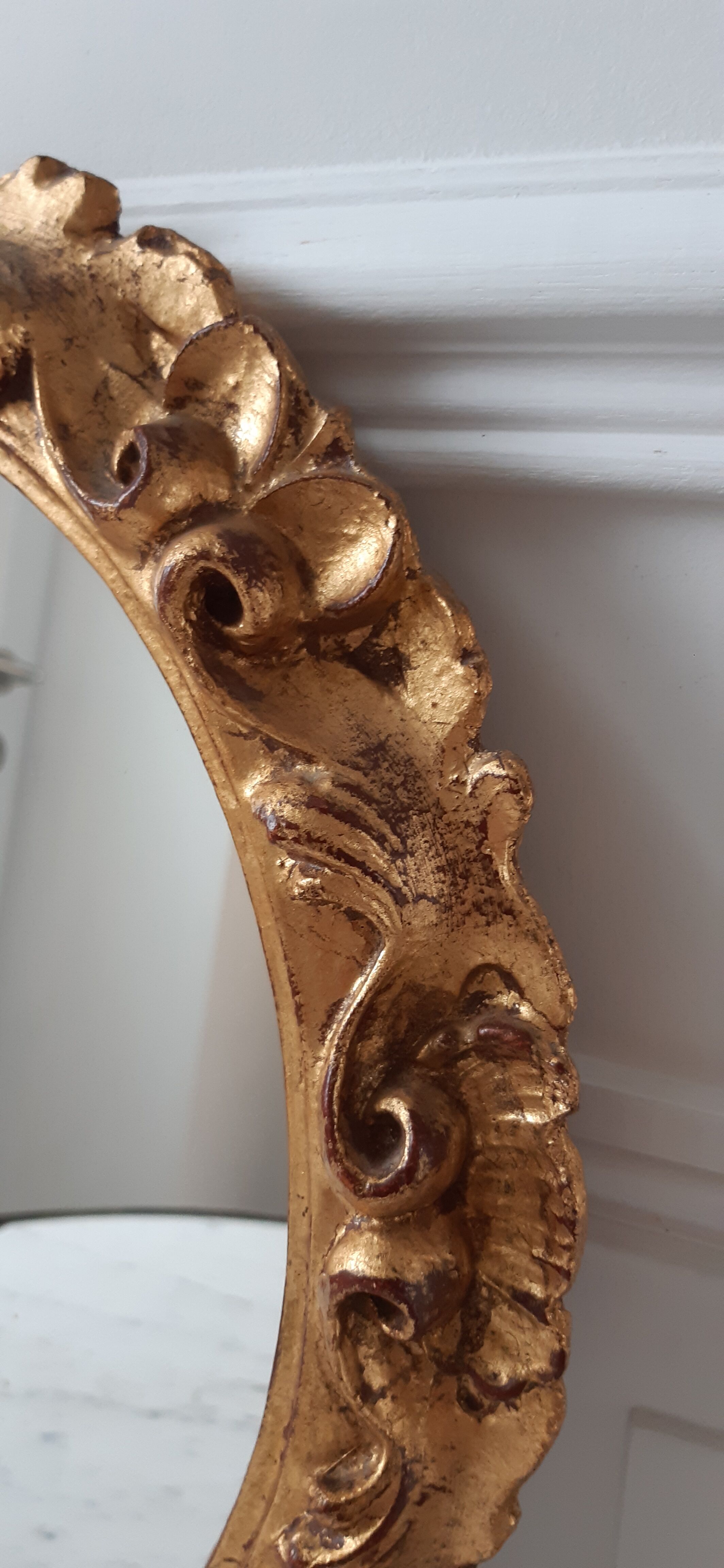 Old mirror in gilded wood late nineteenth