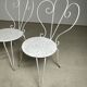 4 vintage wrought iron chairs