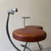 Bar stools in tubular chrome and tan leather, 1970s