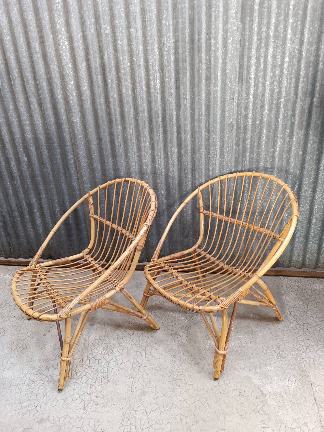 Vintage rattan wicker garden furniture set with 2 shell armchairs and a bar table