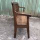 Duo of old solid oak benches with backs and armrests.