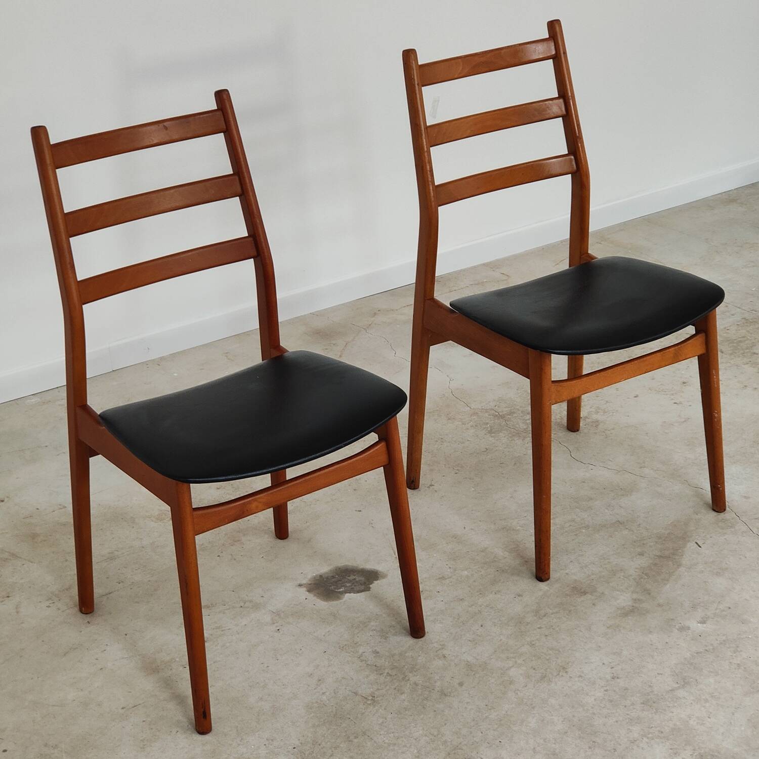 Pair of Scandinavian style leather and wood chairs 1970