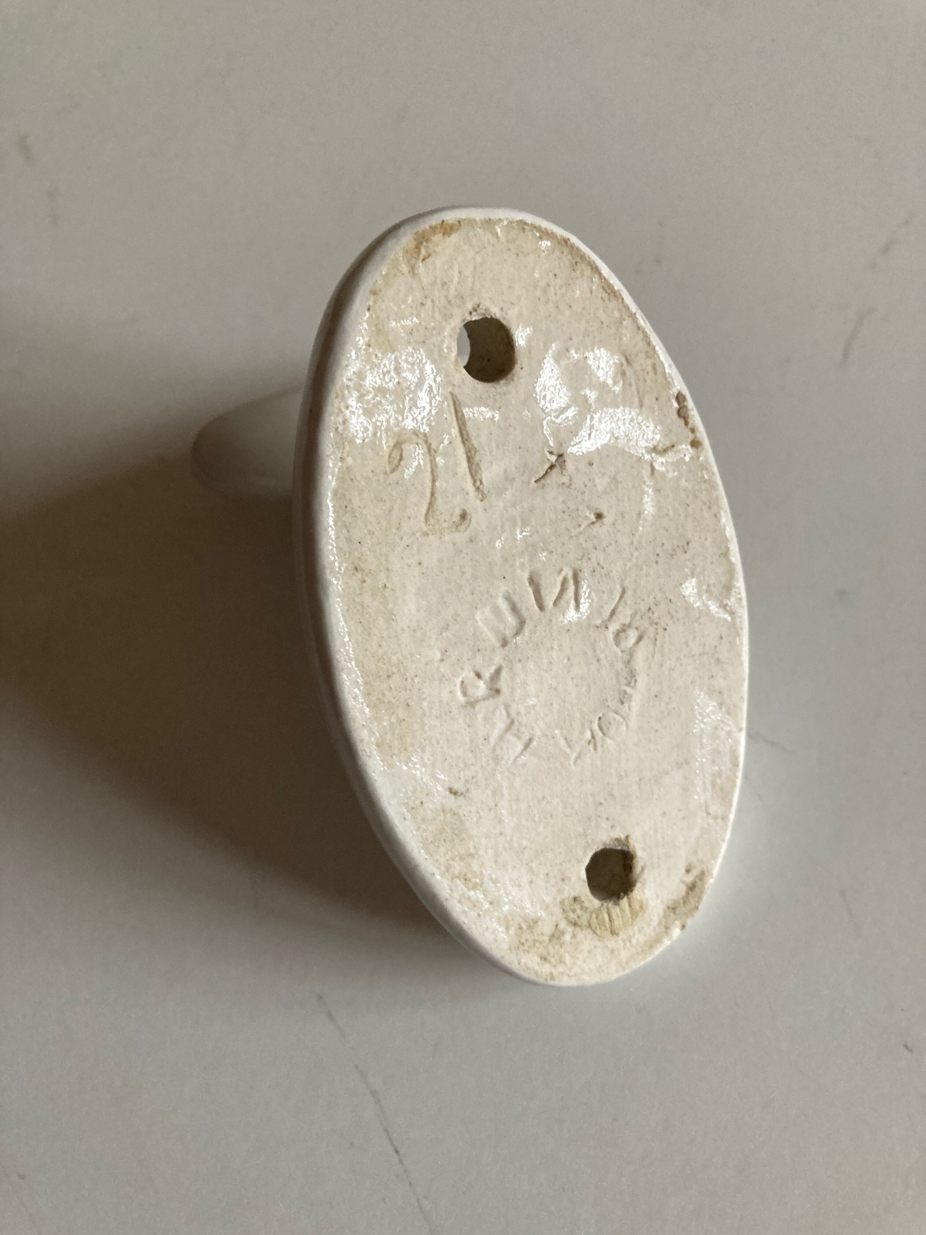 White ceramic bathroom hook 1960s