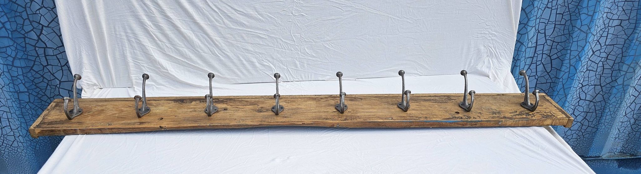Teak coat rack with 8 double cast iron hooks