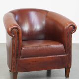 English style sheepskin club chair with a beautiful patina