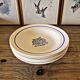 Vintage deep plates in ADP earthenware, blue rose patterns.