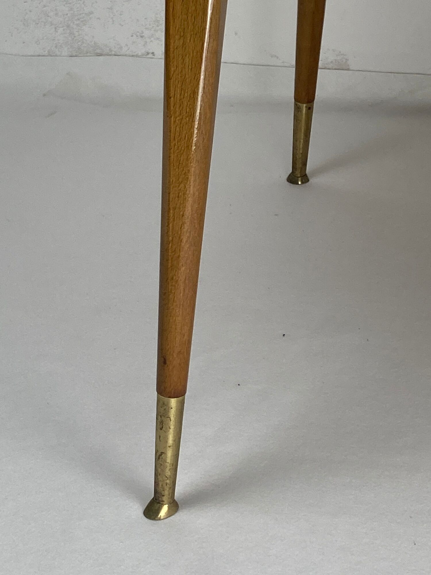 Italian round table with tapered brass leg ends, 1950s