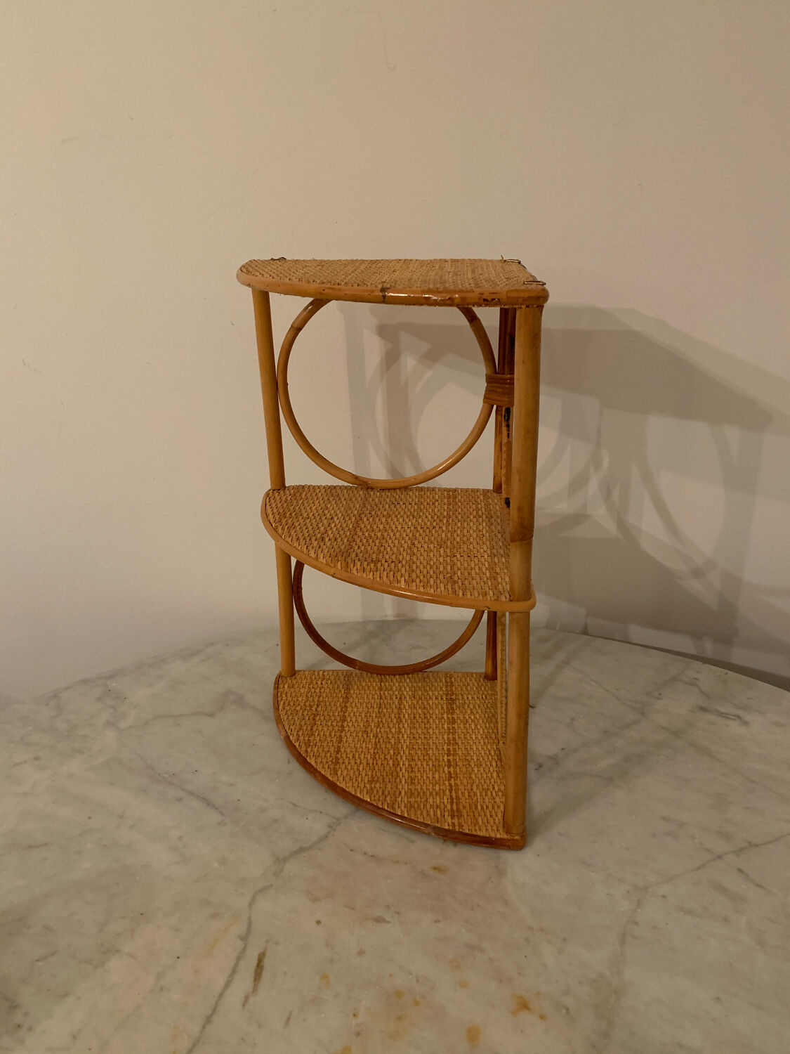 Rattan corner shelf
