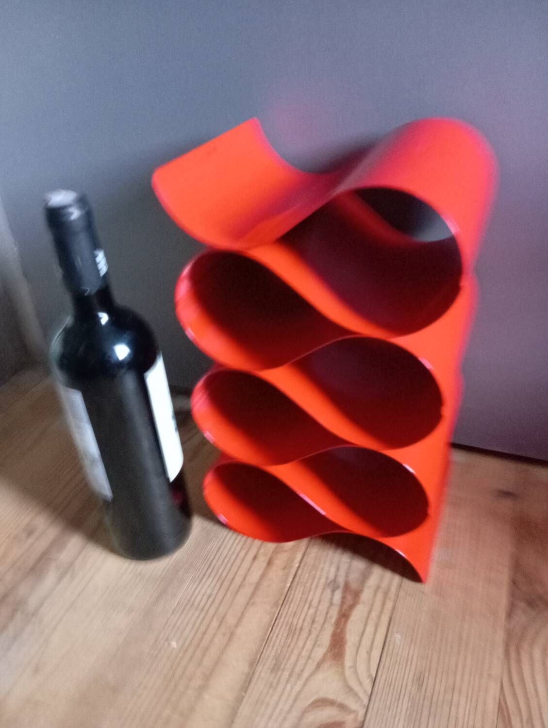 Red painted metal bottle holder, vintage 1980