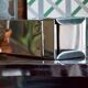 Vintage wall ashtray in shiny metal industrial style