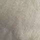 Floral damask cotton tablecloth with central monogram AC.