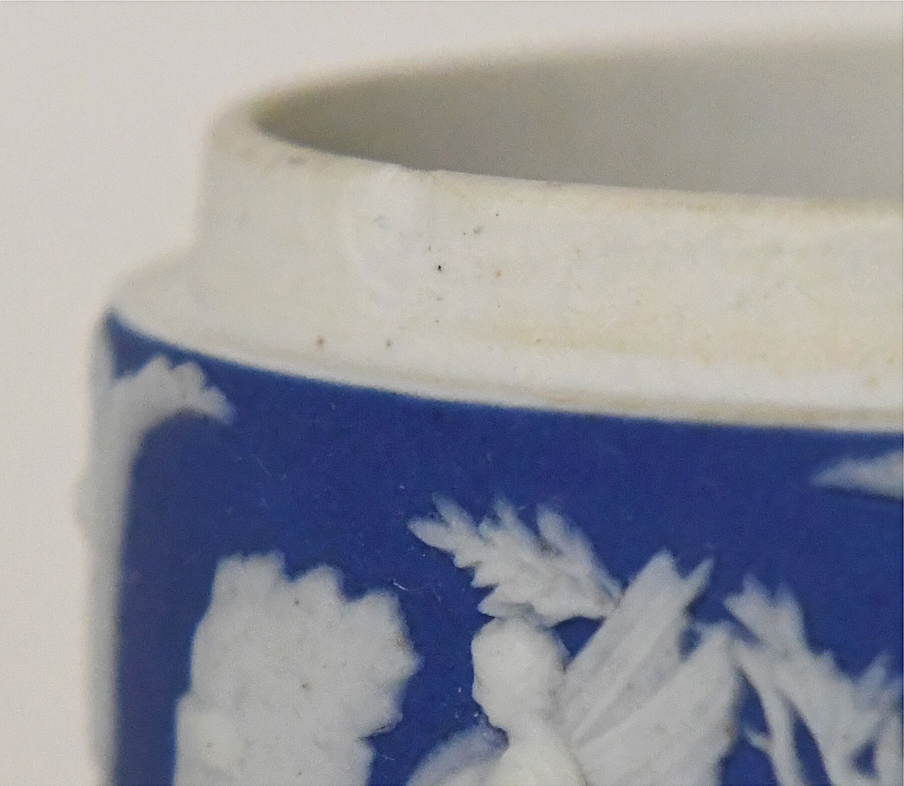 Pair of Wedgwood biscuit boxes with relief decoration of antique scenes