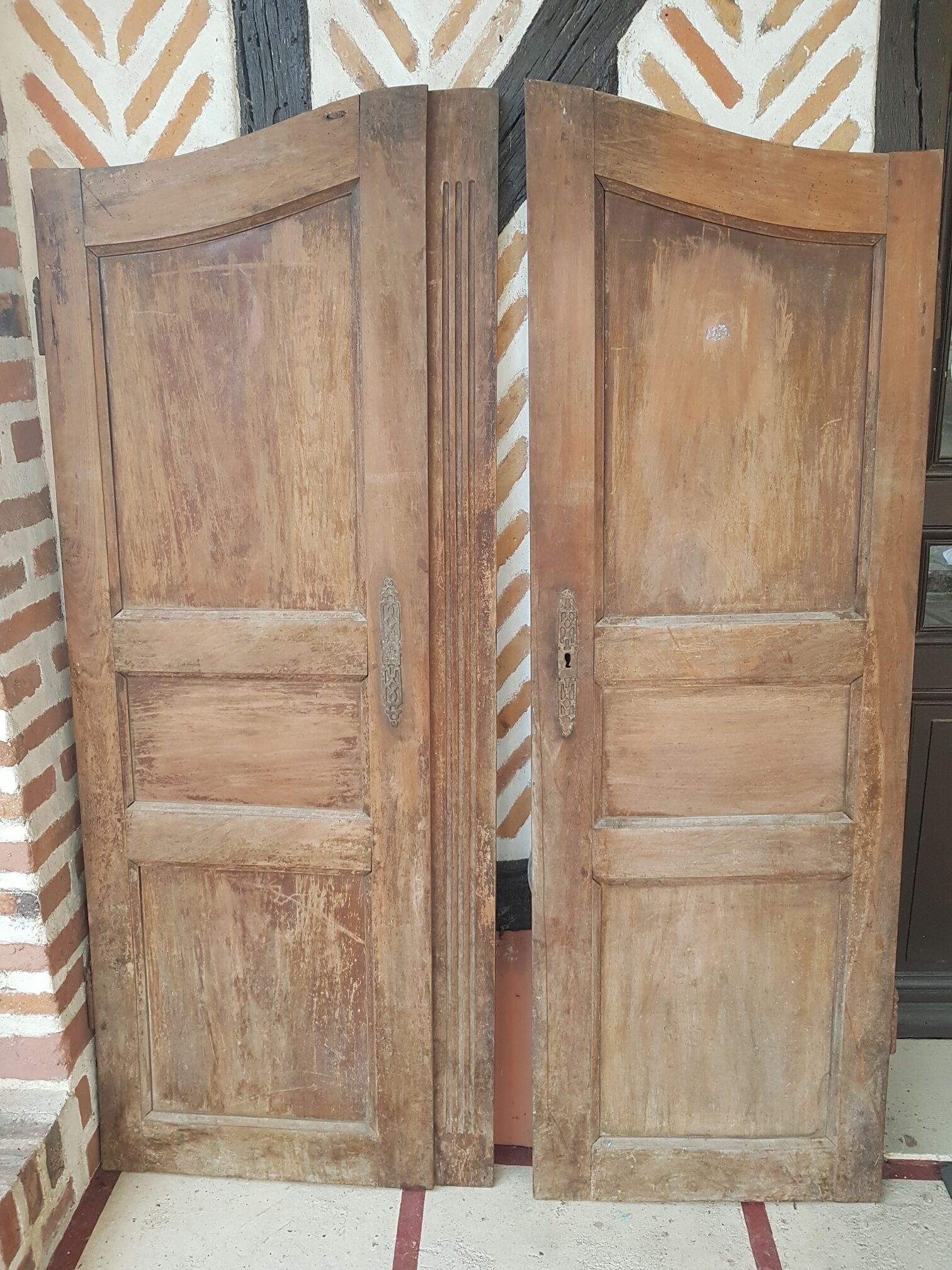 Old pair of rounded cabinet doors