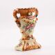 Sublime Capodimonte vase with white and yellow floral patterns.