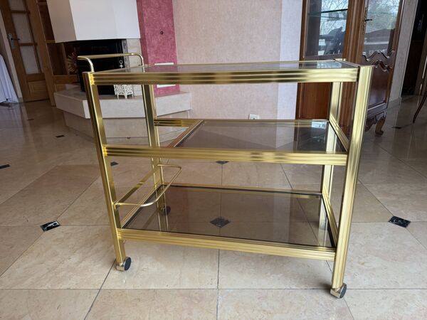 Table desserte à roulette dorée laiton verre fumé