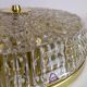 Midcentury crystal and brass ceiling lamp by Orrefors, Carl Fagerlund, 1970s, Sweden.