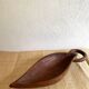 Wooden plate sculpted piece