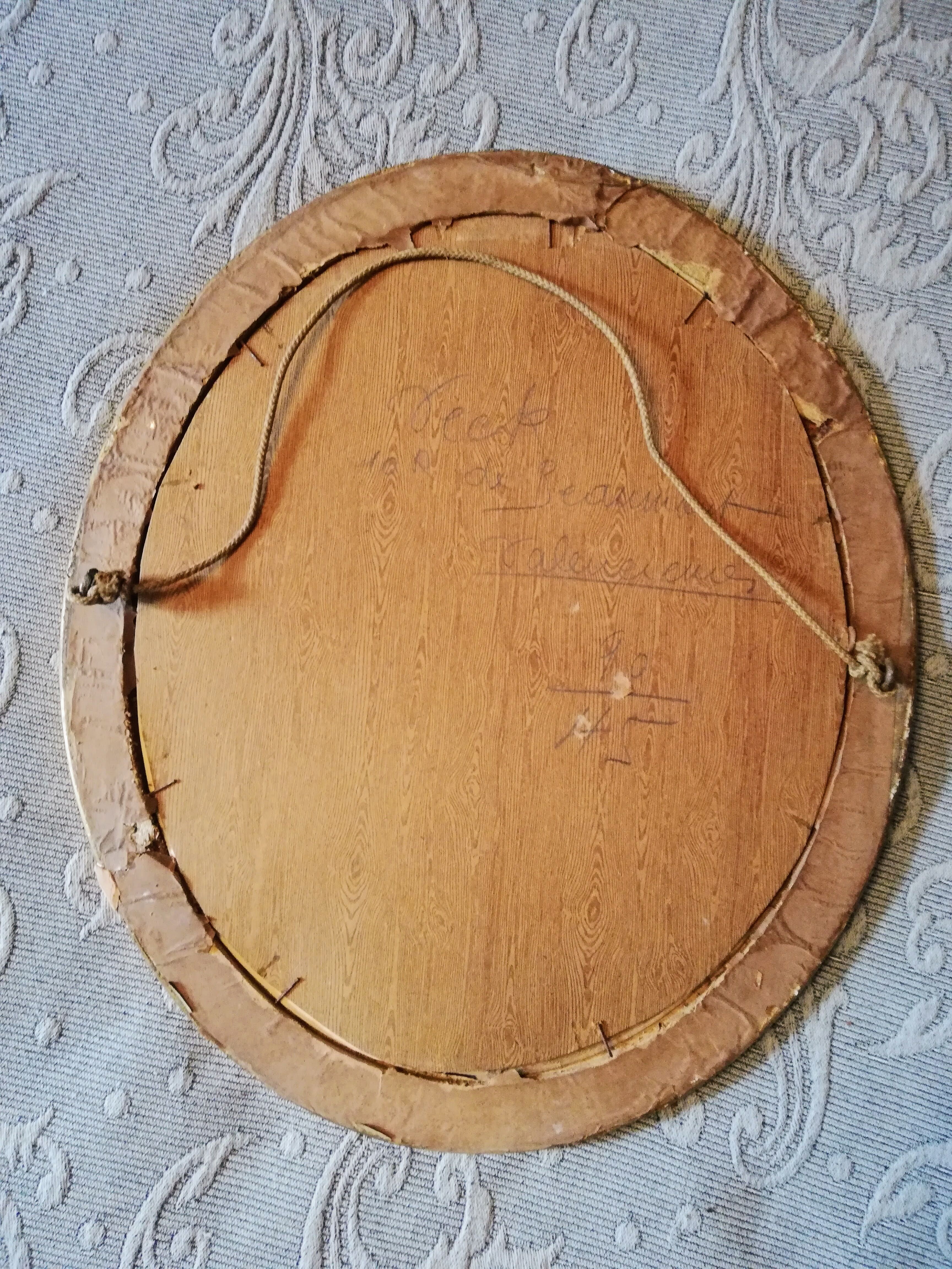 Oval gold frame art deco