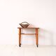 1960s teak coffee table on casters