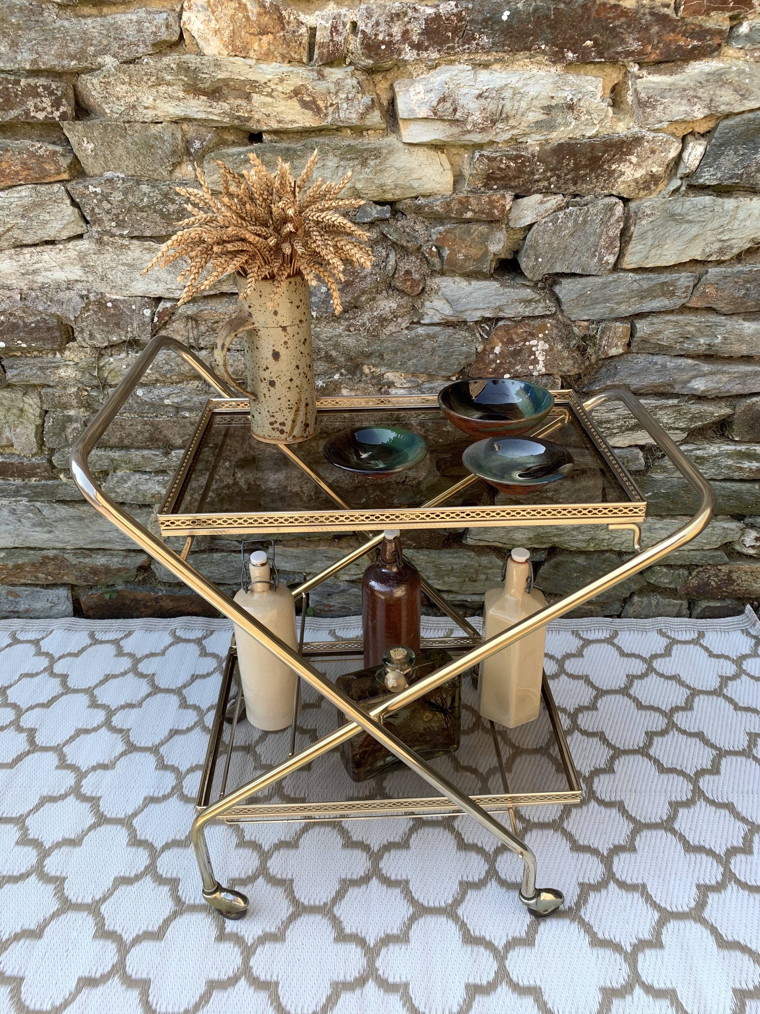 Golden dessert with wheeled glass tray