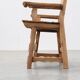 Brutalist armchair with carved rosettes and nailed wooden seat, Spain