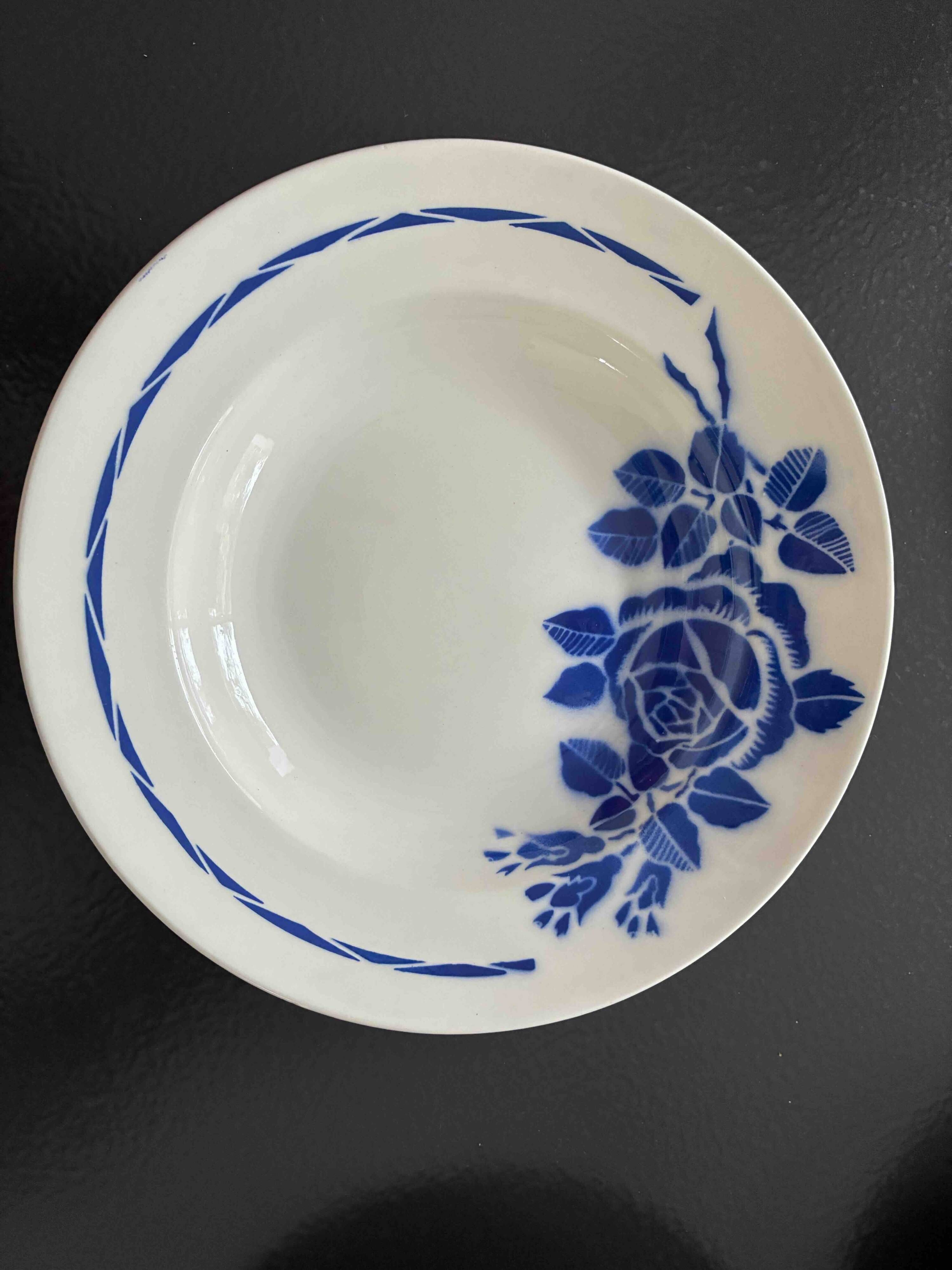 Set of 9 vintage deep plates with blue patterns.