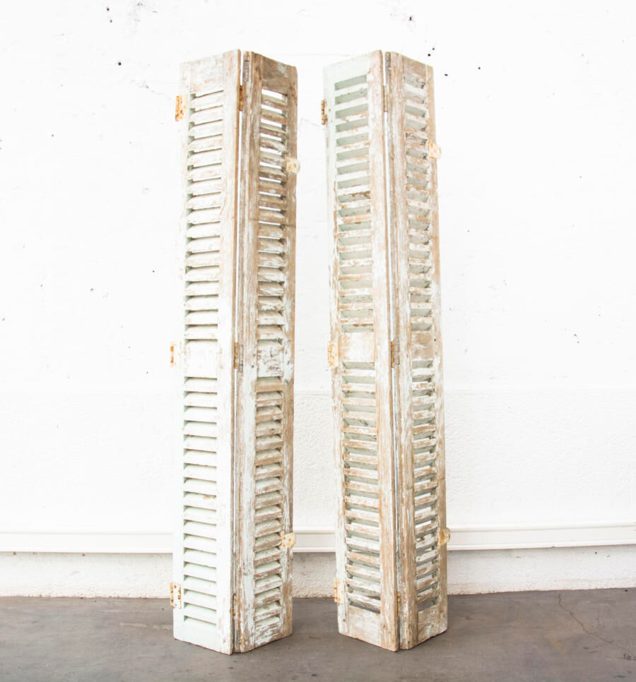 Pair of shutters louvered
