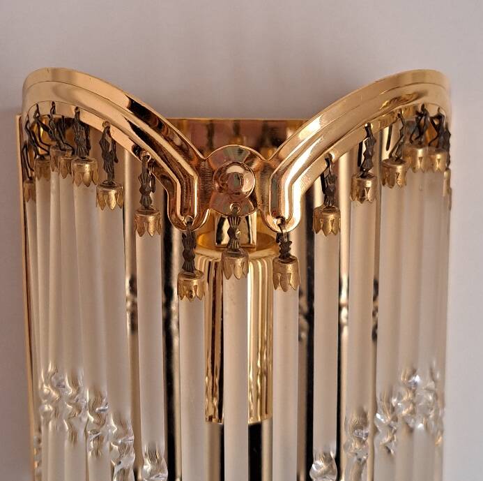 Pair of gold metal wall lights with tassels