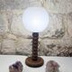 Wooden lamp in wabi-sabi brutalist style by Charles Dudouyt with white opaline.