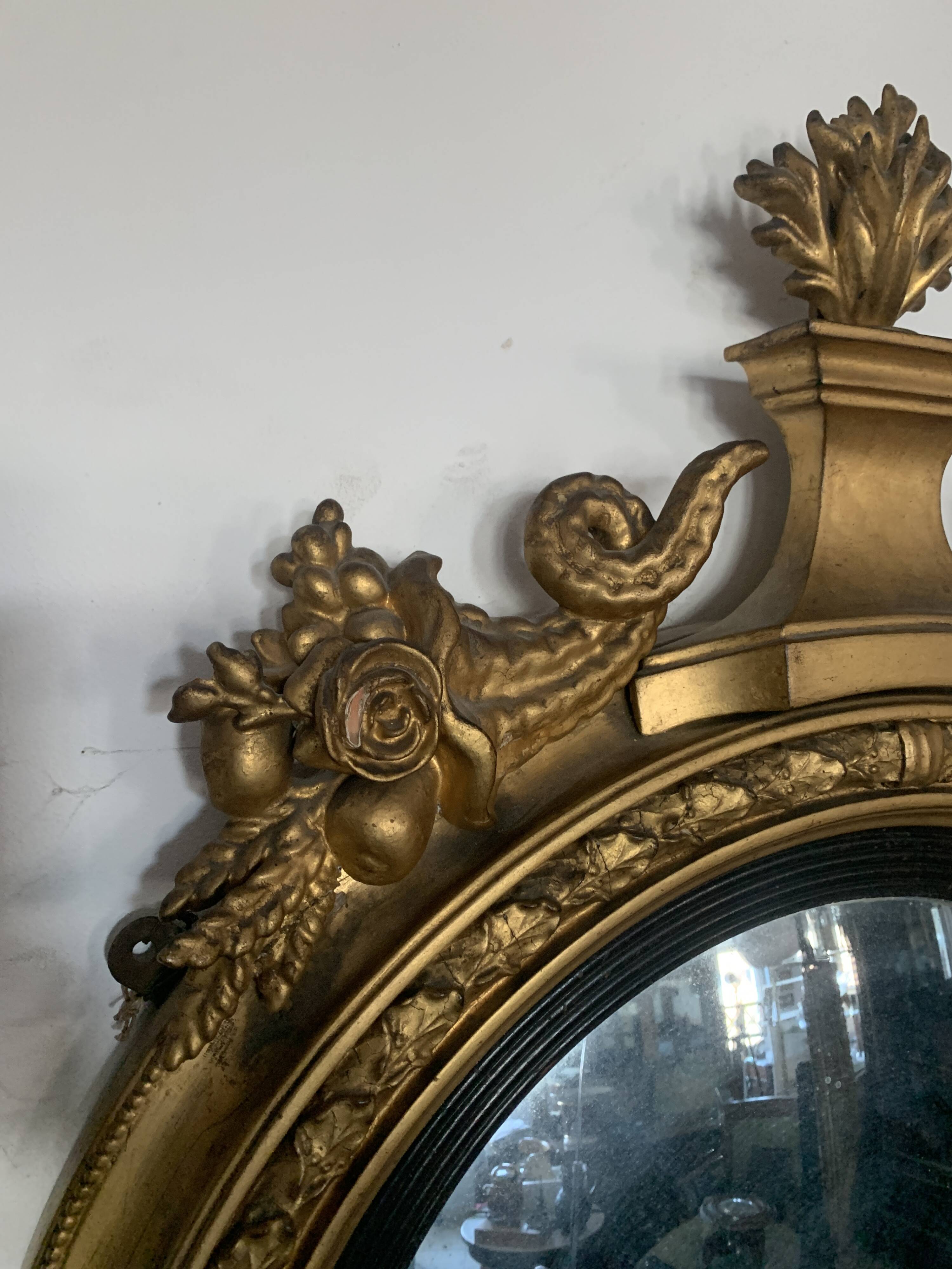 Miroir sorcière en bois sculpté doré XIX siècle