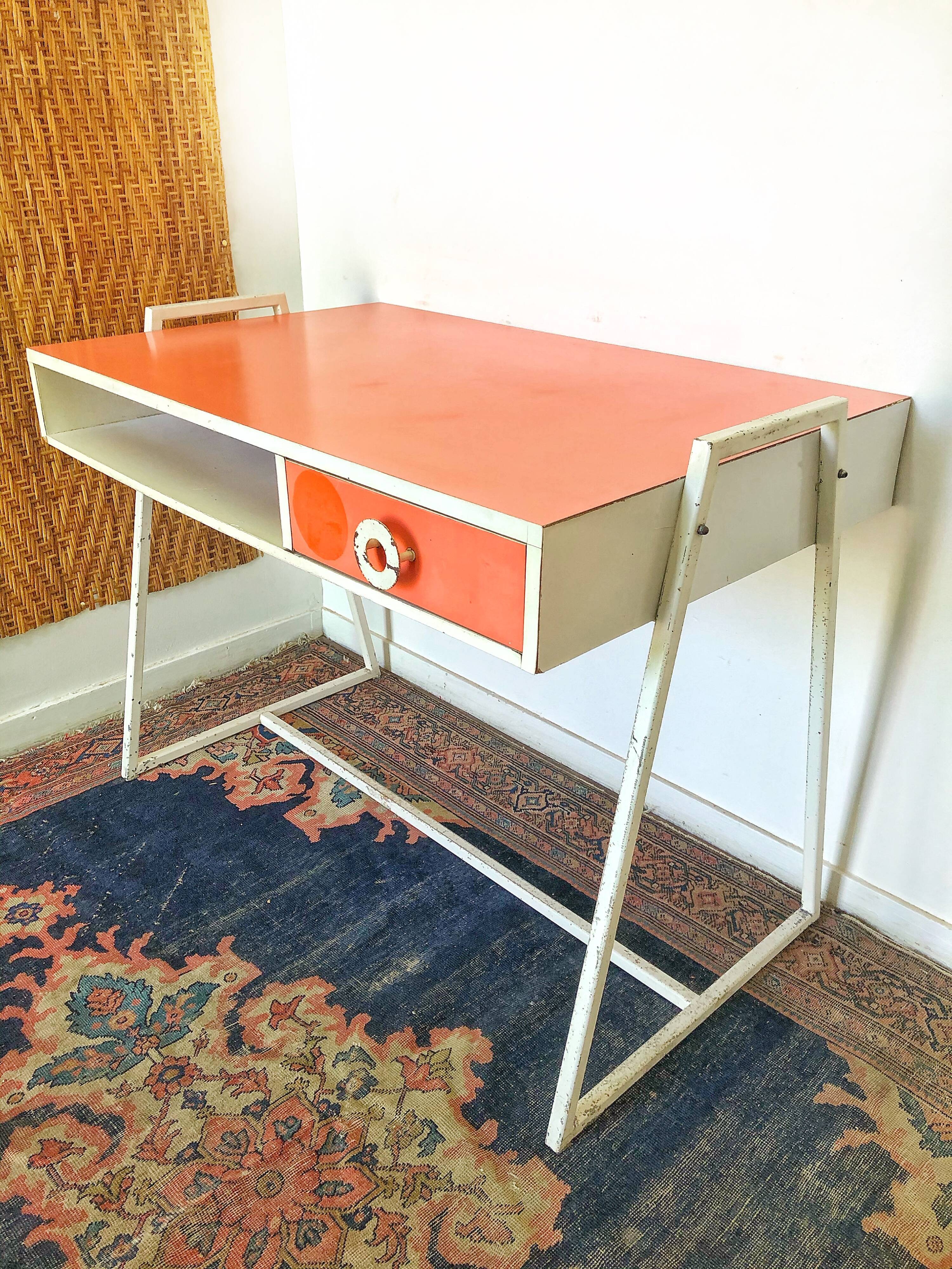 Vintage desk and chair in orange formica