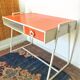 Bureau et sa chaise vintage en formica orange