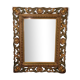 Miroir biseauté et bois sculpté