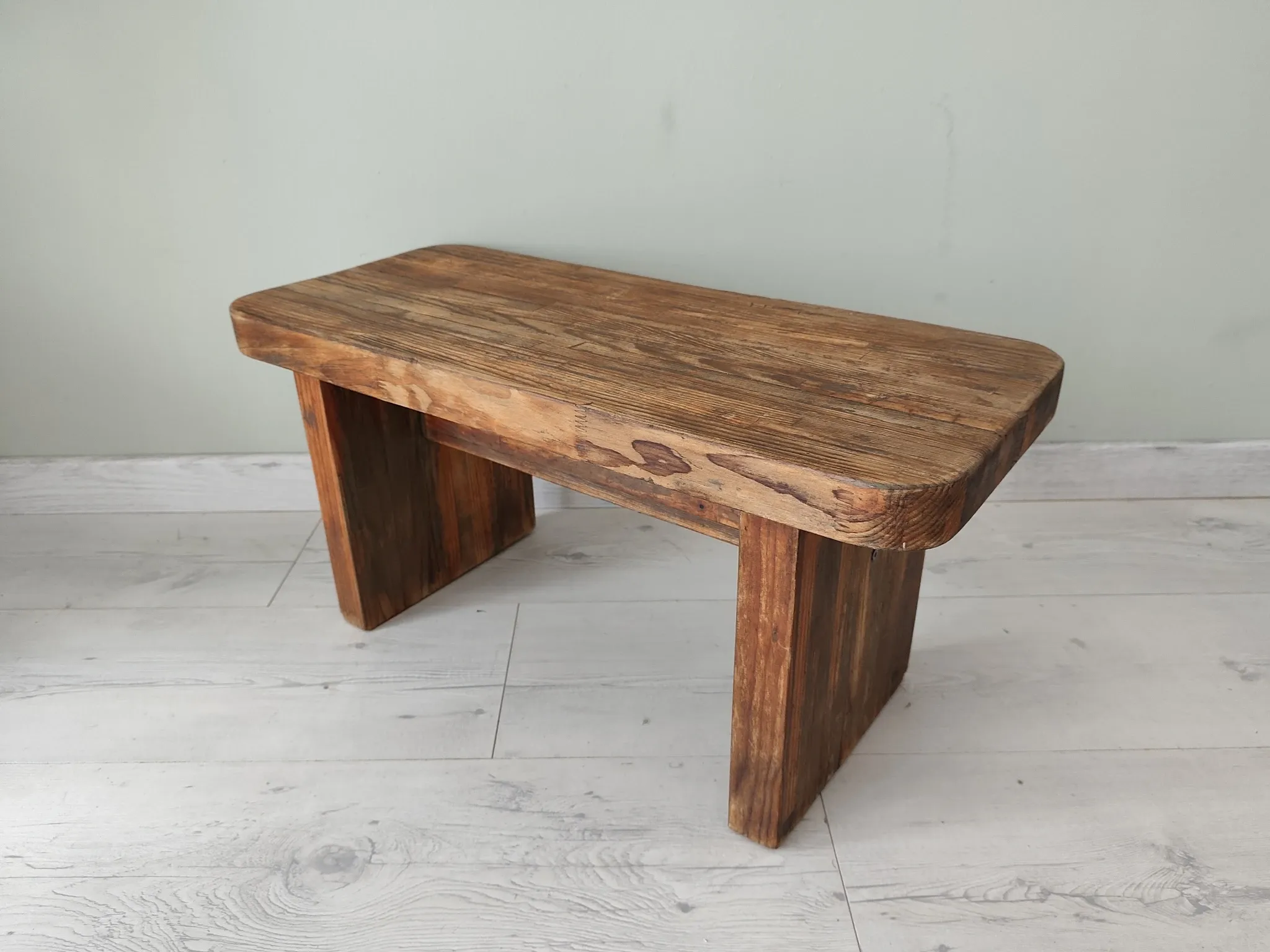 Small rustic wooden bench
