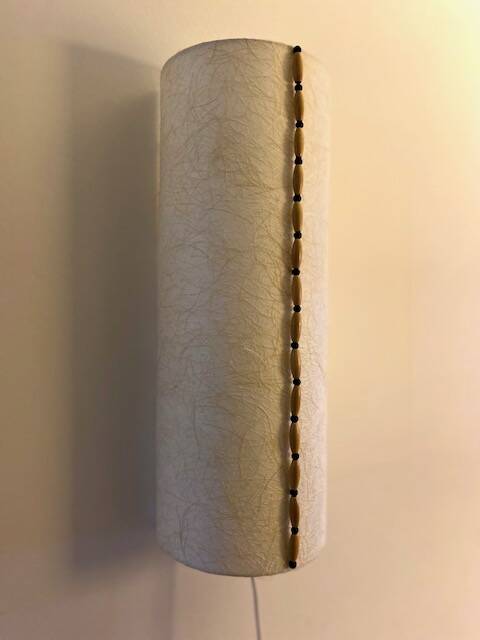 Long Japanese paper applique and bead cord.