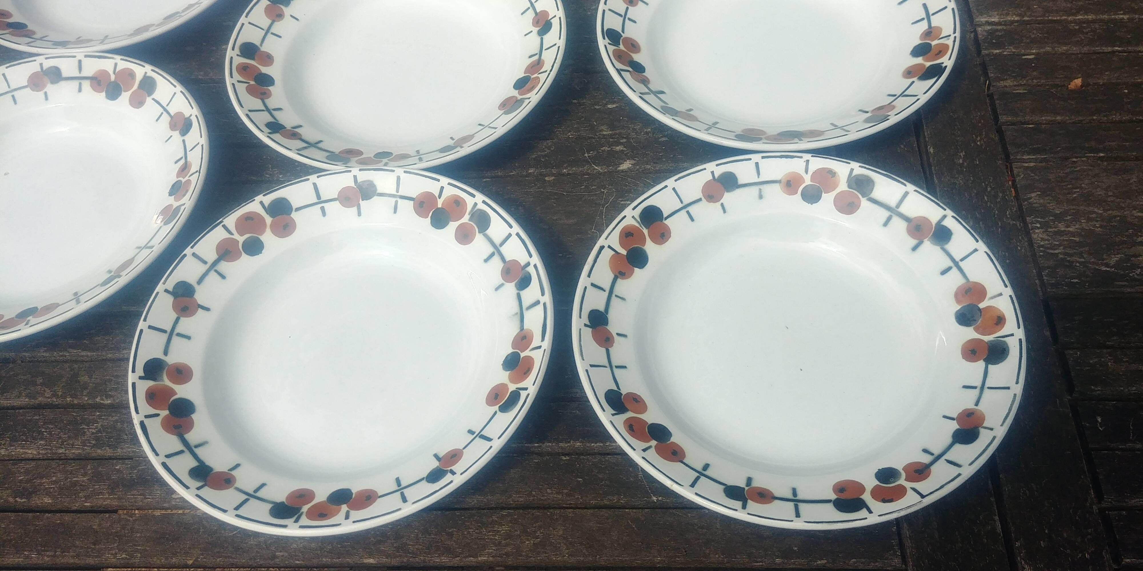 Set of eight ironstone soup plates from the Saint Amand earthenware factory