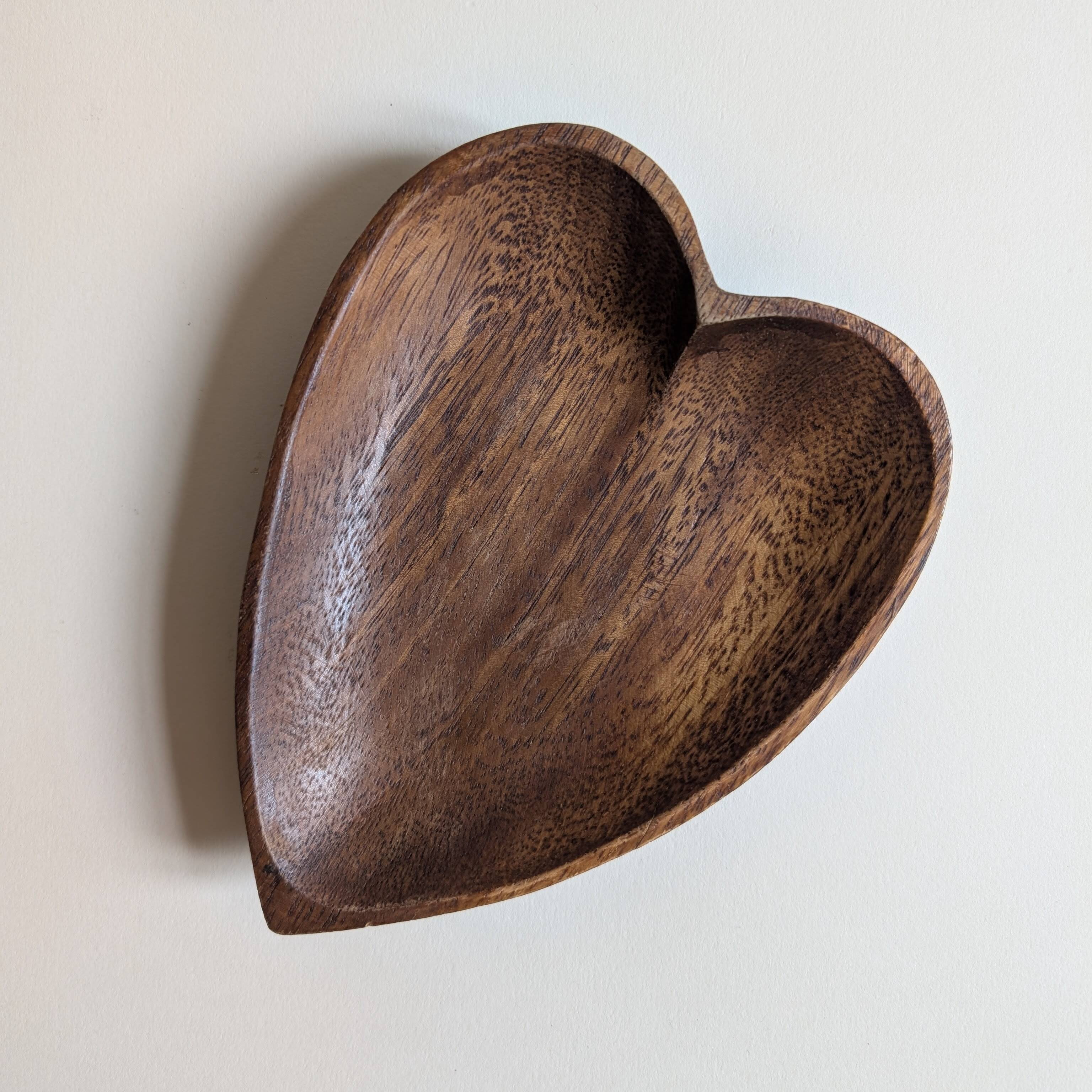 Heart-shaped pocket emptier